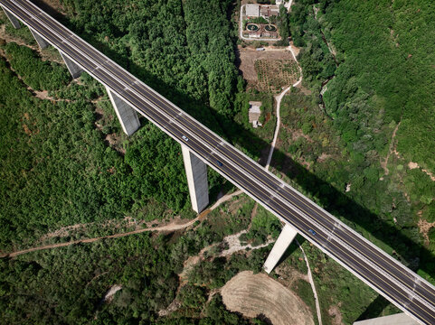 Aerial View of a Highway Bridge Spanning a Deep Valley