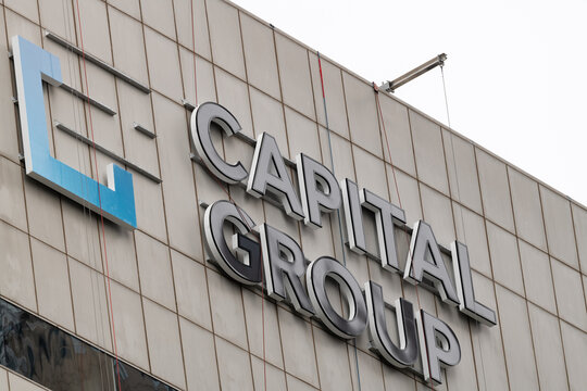 Capital Group East Coast hub in Charlotte, NC installs signage on One Independence Center in uptown Charlotte, NC