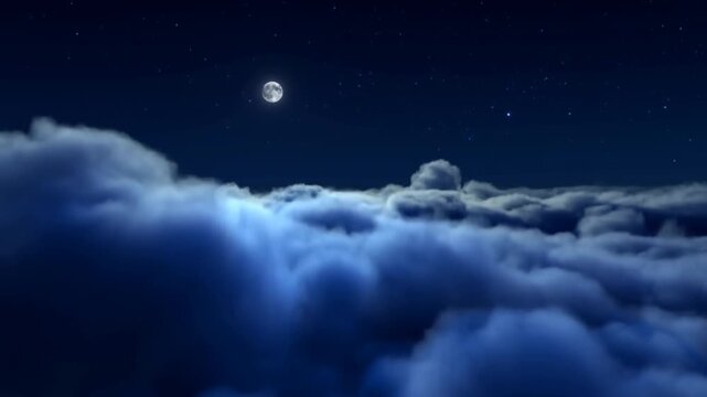 Full moon shines above layered clouds in a deep blue, starfilled night sky