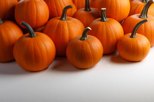 Flat lay arrangement with pumpkins on wooden background