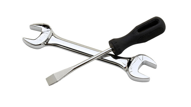 Isolated shiny chrome wrench and classic screwdriver, essential tools for repair and maintenance