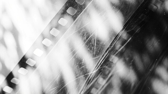 retro film overlay effect with scratch dust and light leaks, retro grain noisy film distressed texture light leak flare on black background, Black and white background - cinema, distressed, glow