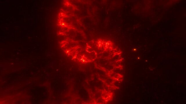 Red plasma cloud swirls and reshapes in a dark starfield with glowing particles