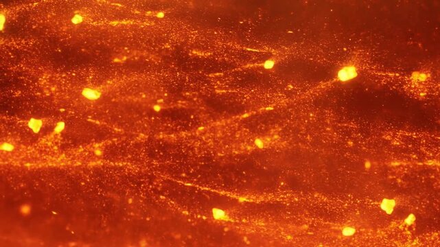 Molten lava glows across a volcanic surface with scattered incandescent fragments