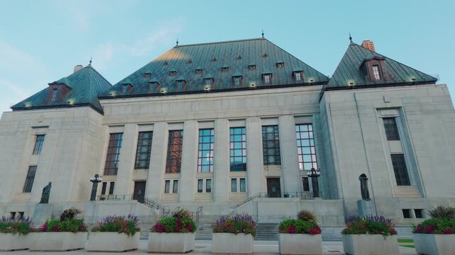 Ottawa, ON, Canada - Oct 14, 2026: Historic exterior of the Supreme Court of Canada building under a clear evening sky