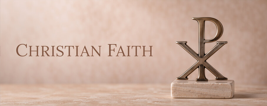 Bronze Chi Rho symbol on marble base with christian faith text. Panoramic religious banner with copy space. Christian Faith typography