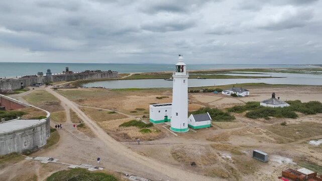 Hurst Point Lighthouse and Hurst Castle from drone over Hurst Spit, Milford on Sea, Lymington, Hampshire, England, United Kingdom