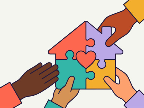 Hands assembling colorful puzzle symbolizing community support and care