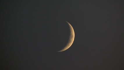 Waxing crescent moon in the evening sky at dusk © Aurelio's Horizons