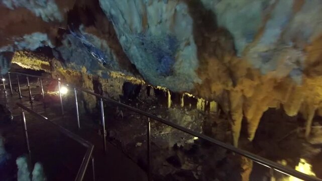 Path in a cave with impressive stalactites and stalagmites, stalactite cave, Diros Cave, Glyafada Cave, Vlychada Cave, Mani, Peloponnese, Greece