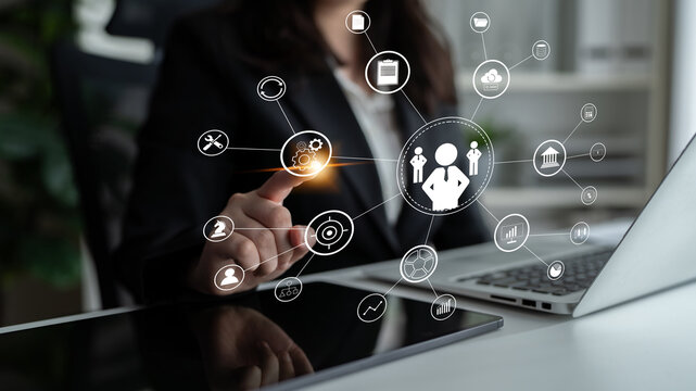 A concept of centralized business management and corporate strategy. A leadership team connecting to all functions like finance, operations, and planning. Motif