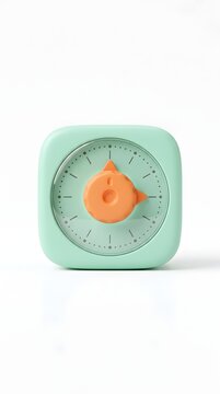 Mint green kitchen timer with orange dial