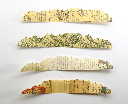 Assorted vintage floral paper borders with botanical patterns and warm tones for handmade projects.