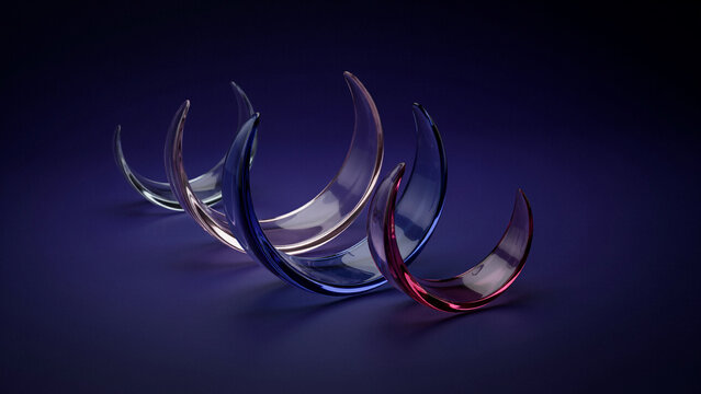 Four crescent shaped glass with colorful light reflections on a dark purple background