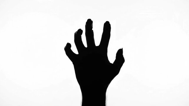 Creepy Black Hand Silhouette Palm Open Halloween Horror Shadow White Background 4K HD 00:05