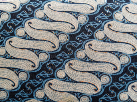 Traditional Indonesian batik parang motif pattern printed on fabric surface