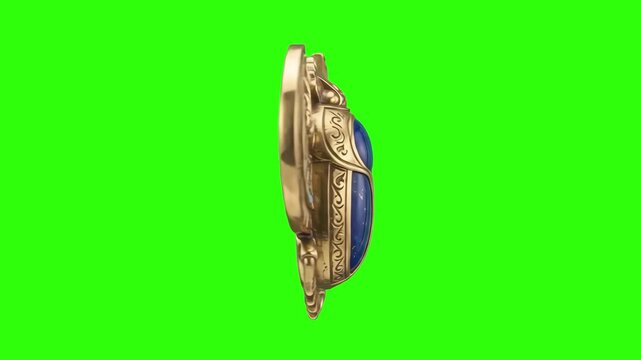 Side profile view of a traditional Egyptian gold scarab beetle pendant with lapis lazuli stone inlay isolated on a studio chroma key green background. Great for history documentaries, museum artifact 