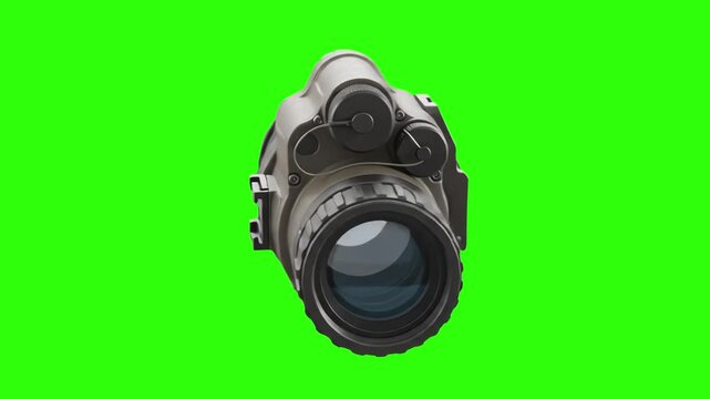 Compact tactical night vision monocular scope (NVG) with mounting interface isolated on a studio chroma key green background. Great for special forces operations, night surveillance videos, tactical g