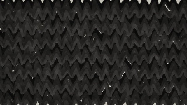 Black and white woven fabric texture with subtle light shifts and abstract pattern movement
