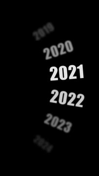 Vertical spinning year timeline animation stopping at 2027 for new year social media video backgrounds