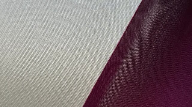 Diagonal Two Tone Burgundy and Cream Woven Synthetic Fabric 4K Video