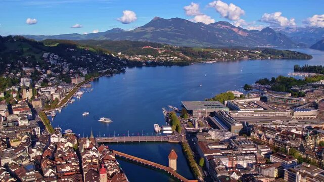 Aerial view of Lucerne old town with Chapel Bridge, Lake Lucerne and Swiss Alps, Switzerland