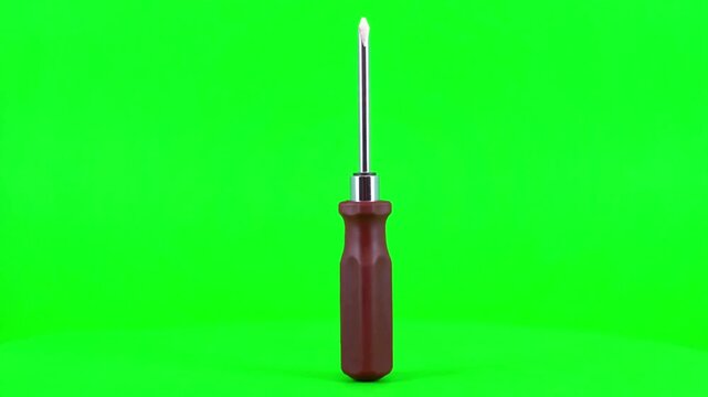 Flathead screwdriver on green screen