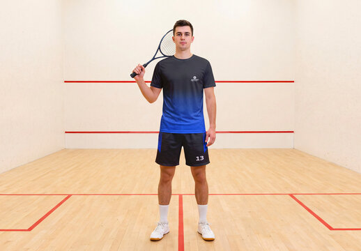 Squash Sportswear Jersey and Shorts Mockup on Male Athlete in Indoor Court