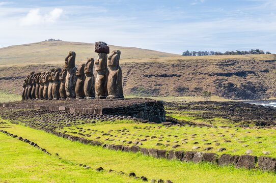 Outdoor scene showing the Ahu Tongariki architectural site, home of 15 moai statues on easter island.