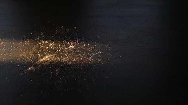 Invisible Household Dust Revealed by Raking Light