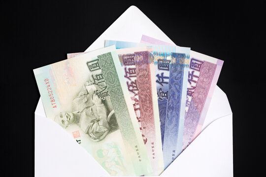 New Taiwan dollar in a white envelope