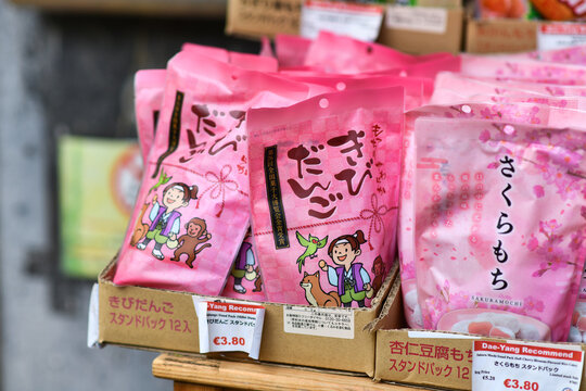D&uuml;sseldorf, Germany - June 9th 2026: 'Kibidango ko hoso' rice cake packaged snack displayed in Asian supermarket, traditional Japanese millet dumpling confection in modern retail packaging