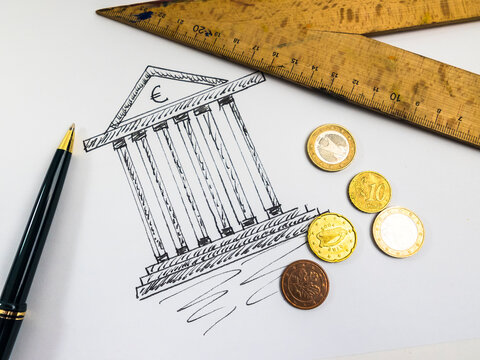 Drawing of a tax office, ballpen, ruler and coins