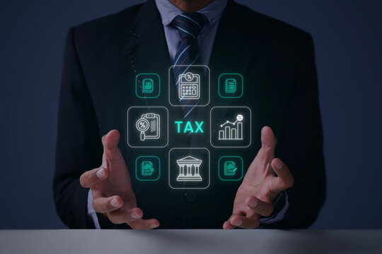Businessman Interacting with Holographic Tax Audit Icons Between Hands