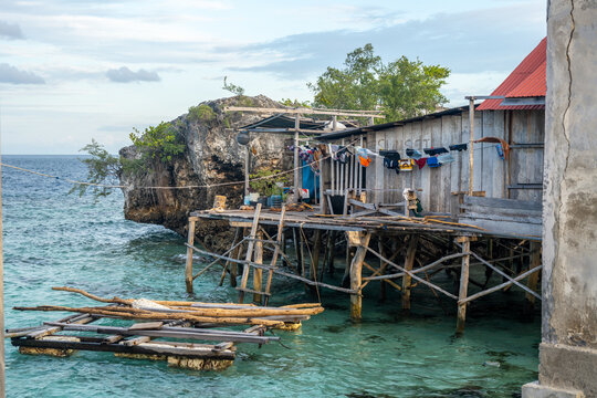Fishermen houses and boats in Bajo village of Pulau Papan Sulawesi Indonesia