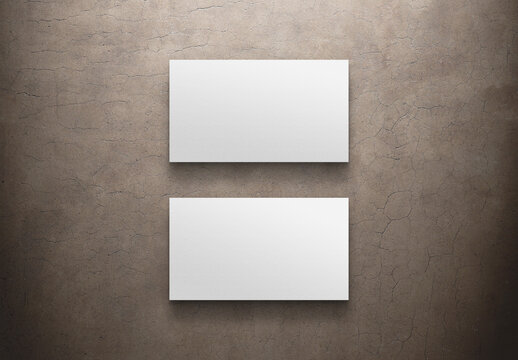 Two Minimalist business cards isolated on concrete Mockup. 3D rendering