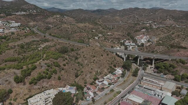 Malaga, Spain aerial view towards A7 highway bridges crossing the valleys near Este