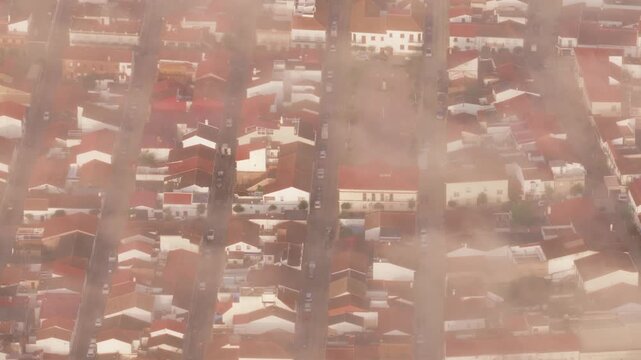 Aerial view of the town of El Campillo with its characteristic red-tiled rooftops and narrow streets in El Campillo, Andalusia, Spain.