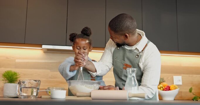 Child, dad and mixing with bowl in kitchen for culinary art, teaching and bonding together. Father, kid or learning with whisk, ingredients or dessert recipe for baking, skill or development in home