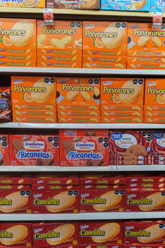Villa de Alvarez, Colima. Mexico. June 24, 2026: Brightly lit supermarket aisle with shelves of Marinela and Gamesa cookie boxes.