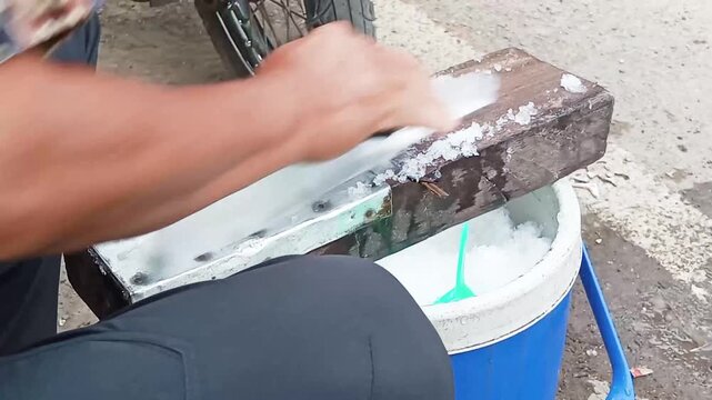 Traditional ice shavers operate on the mechanical principles of an inclined plane and simple linear cutting; they were effective for their time, require no electricity, and produce finely shaved ice.