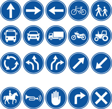 Traffic signs featuring blue circular icons provide clear visual instructions for road safety, vehicle navigation, and pedestrian movement.