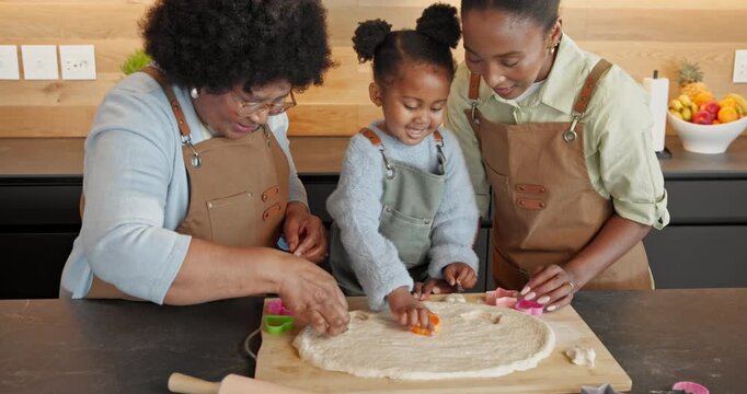 Baking, black family and cookie cutter in kitchen for quality time, bonding or shape in home. Dessert, recipe or happy child with mother and grandmother for learning, generations or dough for biscuit