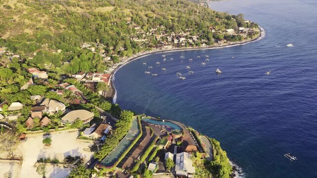 Amed on Bali&rsquo;s eastern coast in Karangasem, Indonesia, features a scenic volcanic shoreline, traditional fishing villages, black sand beaches and clear waters overlooking the Bali Sea