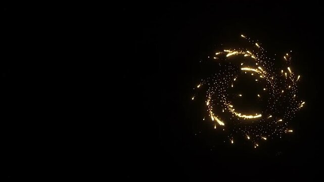 Golden sparkling firework burst on black background.