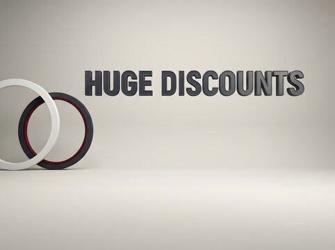 Huge discounts text sign with black and white circular rings on a soft gray background
