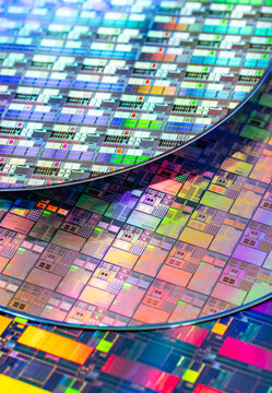 High-tech Macro Photography of a Colorful Silicon Wafer with Microchip Patterns for AI Hardware and Semiconductor Industry Concept.
