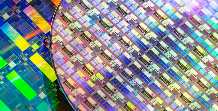 High-tech Macro Photography of a Colorful Silicon Wafer with Microchip Patterns for AI Hardware and Semiconductor Industry Concept.