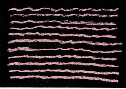 An abstract crayon scribble in colour on a black background.