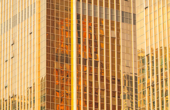 golden shining office tower building glass background Insulation modern building facade